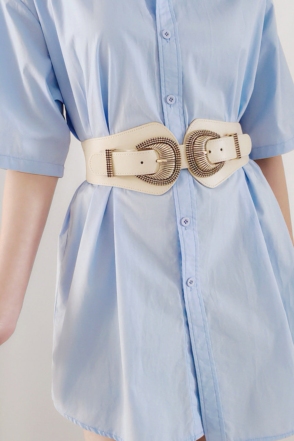 Cream corset belt with double ornate gold buckles and leather straps