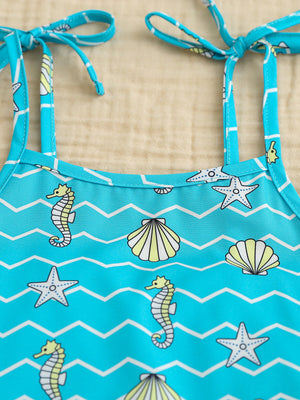 Toddler cami top with seahorse and seashell print, tie straps, blue cotton blend