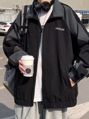 Black and grey colorblock zip-up jacket with a collared neckline