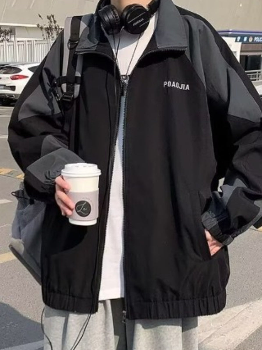 Black and grey colorblock zip-up jacket with a collared neckline