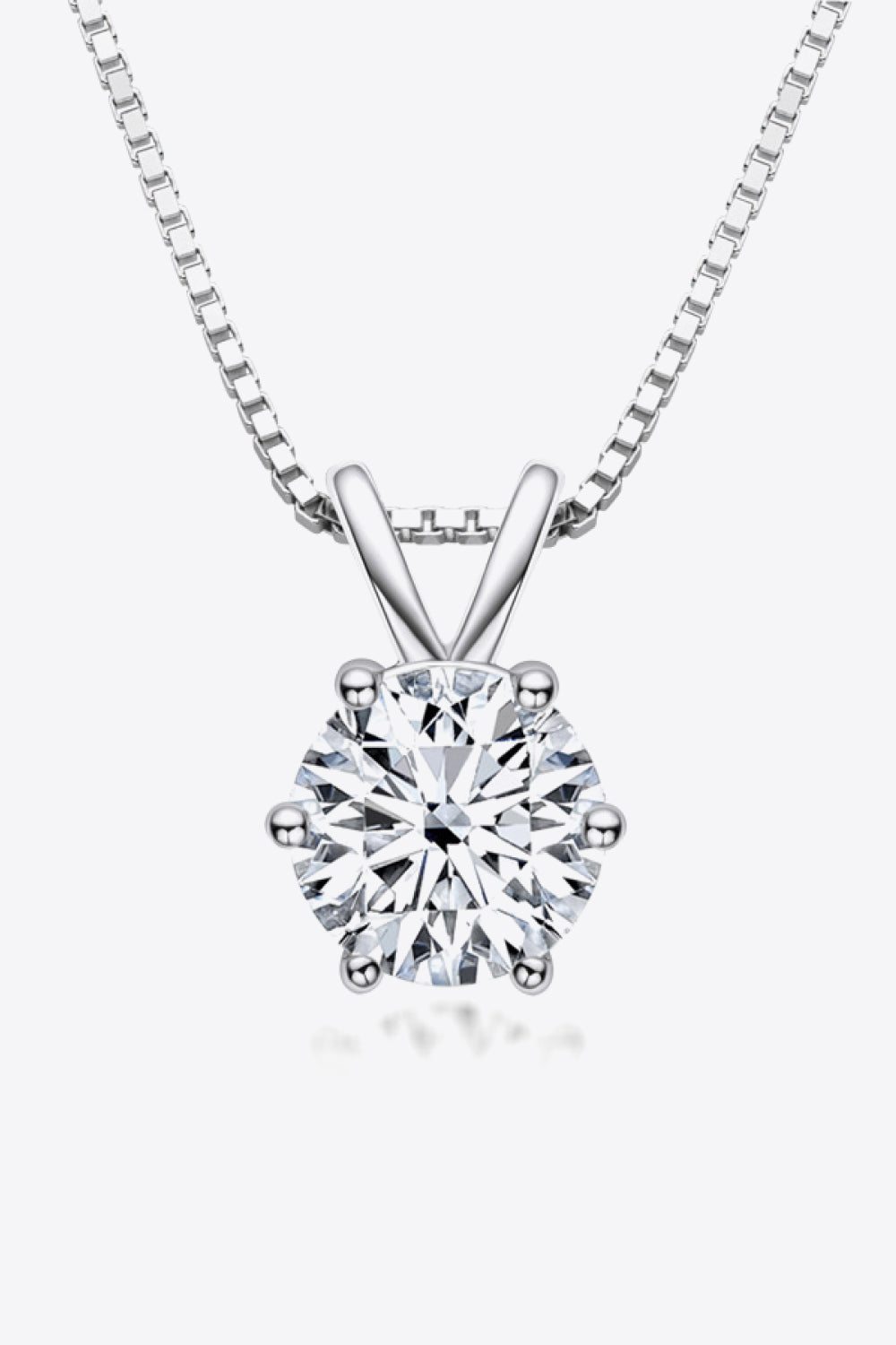 Silver moissanite pendant necklace with 1 carat round brilliant cut stone on 925 sterling silver box chain.