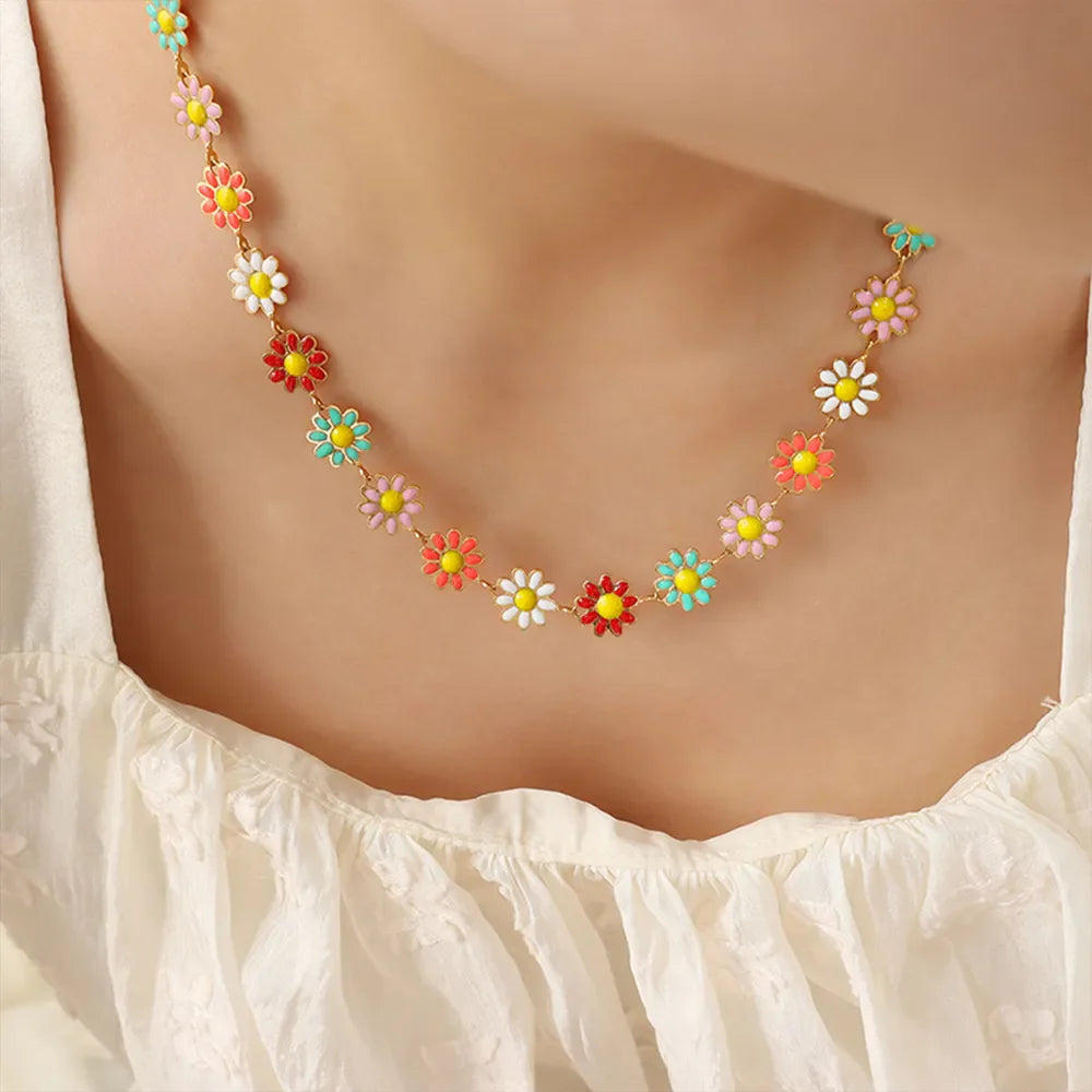 Gold daisy chain enamel collar necklace with colorful flowers