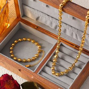 Gold Orb Chain Collar Necklace and matching bracelet, 18K gold-plated copper.