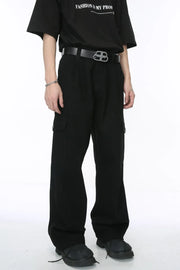 Black wide-leg cargo trousers with pleats and flap pockets.