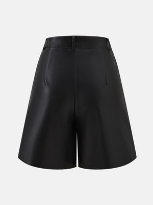 Black vegan leather bermuda shorts with buttoned waist and tailored fit