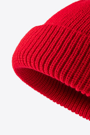 Red ribbed knit beanie with folded edge detail