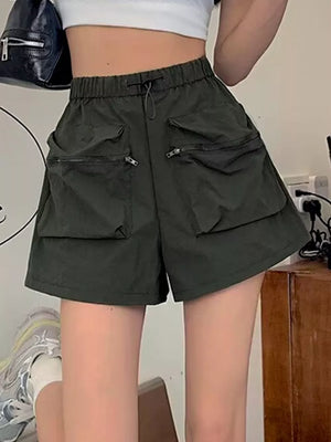 Army green cargo shorts with adjustable drawstring and multiple zippered pockets.