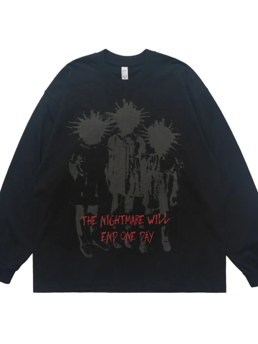 Black cotton long sleeve tee with oversized fit and graphic print with text.
