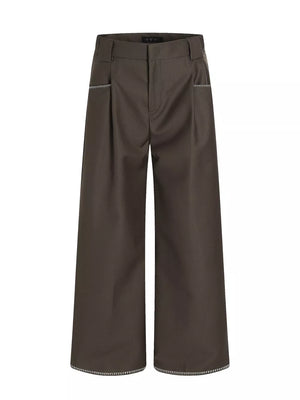 Brown relaxed fit wide-leg pants with decorative trim on pockets and hem.