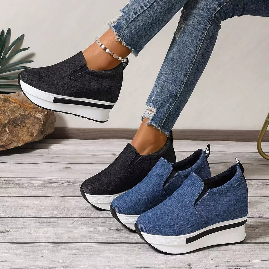 Chic round-toe platform slip-on shoes in black and blue with chunky soles.