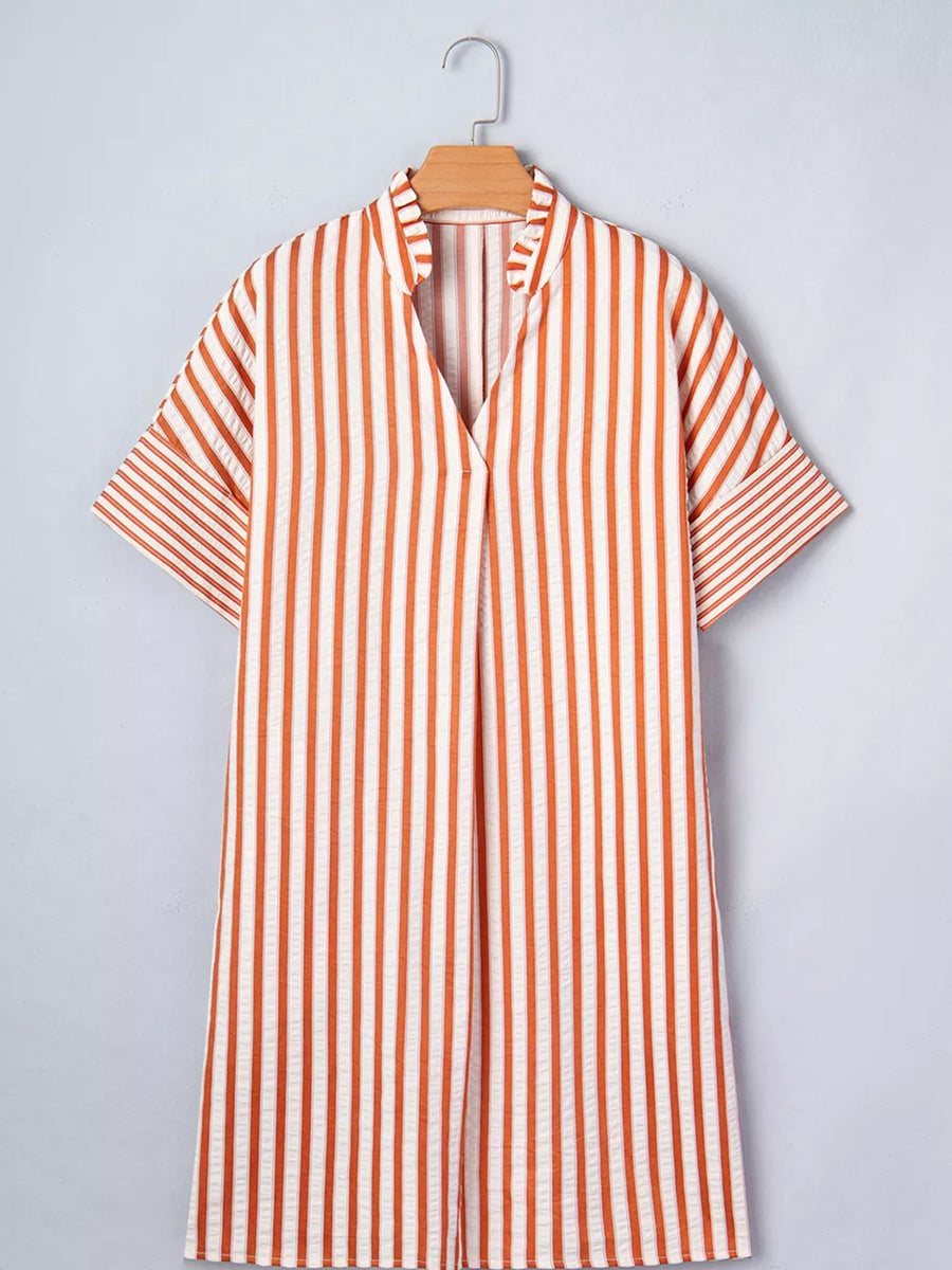 Striped V-neck shift mini dress with short sleeves and a relaxed fit.