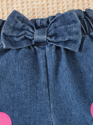 Denim shorts with elastic waist and bow detail