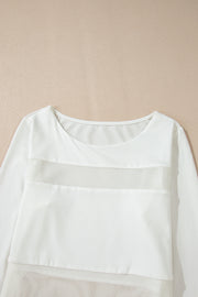 White mesh panel illusion bodysuit with long sleeves and round neckline.