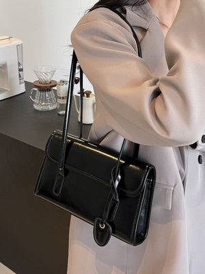 black shoulder bag with small and snap
