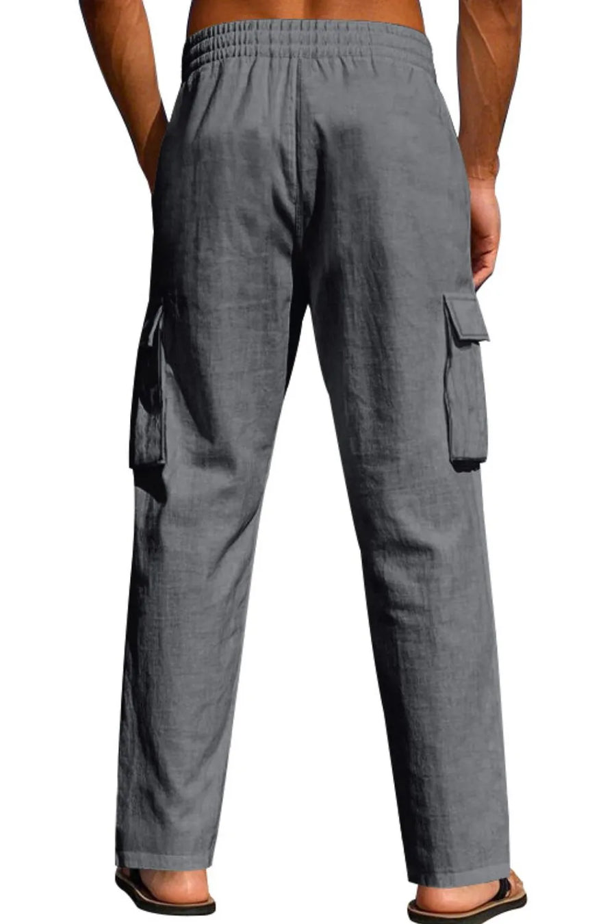 Relaxed-fit dark gray cargo pants with drawstring waist and side pockets.