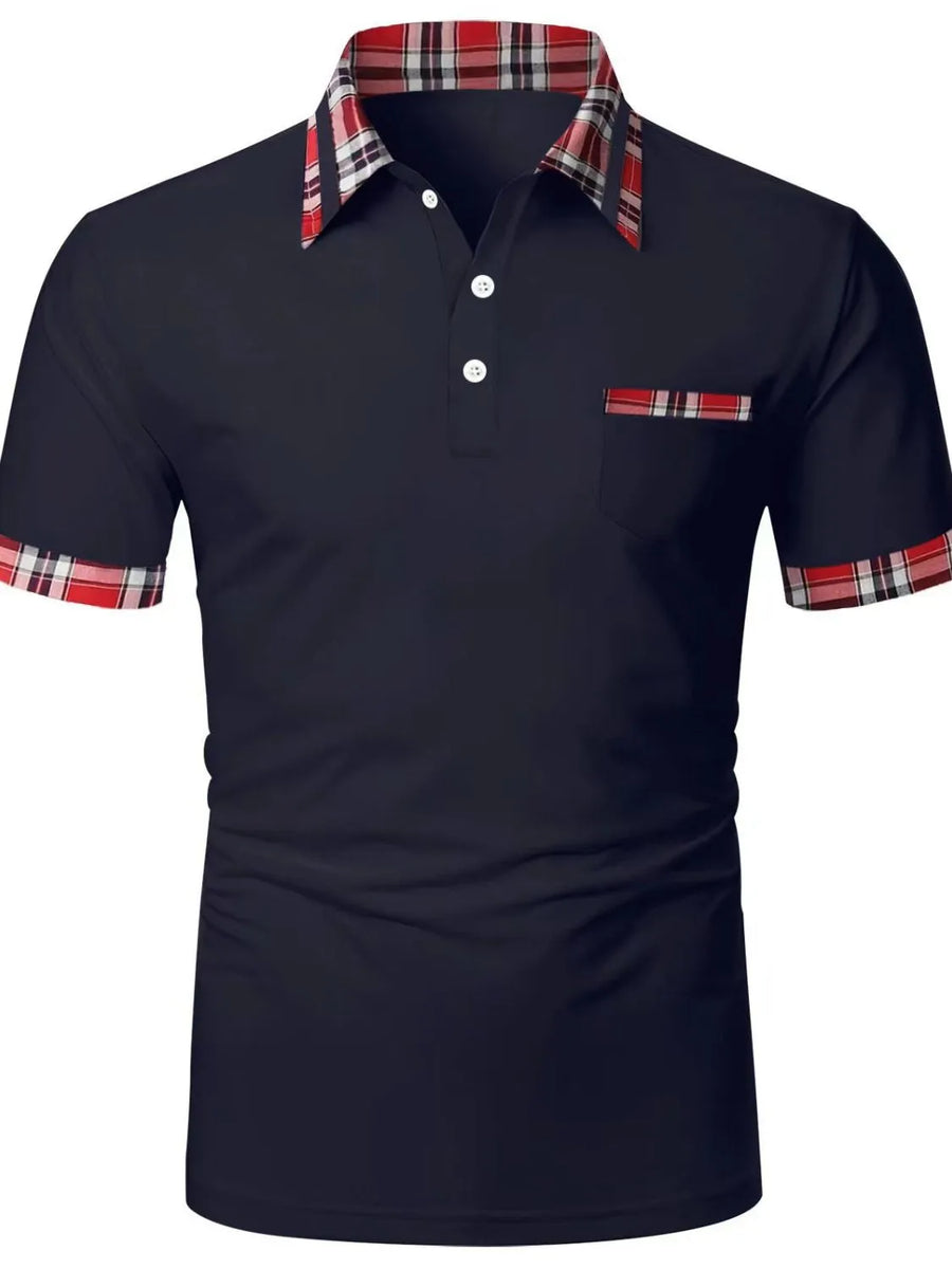 Navy polo shirt with plaid collar, pocket trim, and sleeve cuffs.