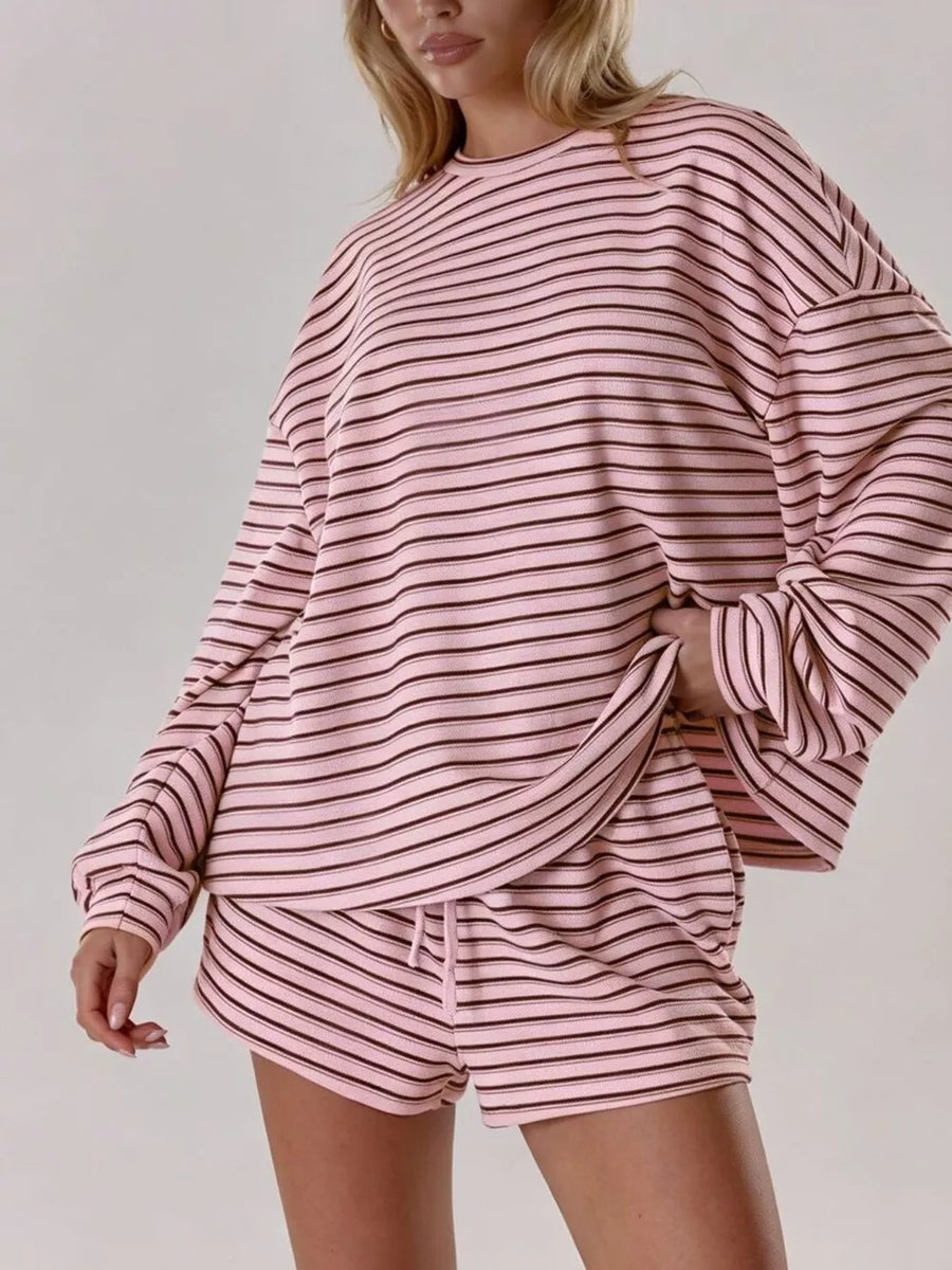 Pink pajama set with elastic waist and long sleeve