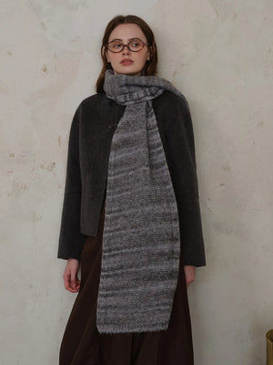 Textured mélange knit scarf in Dark Gray with horizontal stripe pattern and fringed hem.