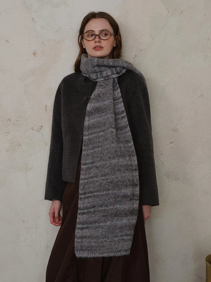 Textured mélange knit scarf in Dark Gray with horizontal stripe pattern and fringed hem.