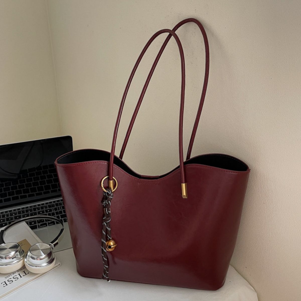 Burgundy pu leather large tote bag with decorative tassel detail