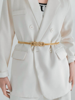 Gold intertwined knot waist belt with a thin metallic strap.