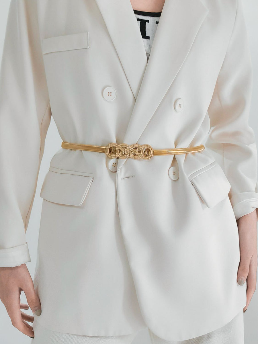 Gold intertwined knot waist belt with a thin metallic strap.