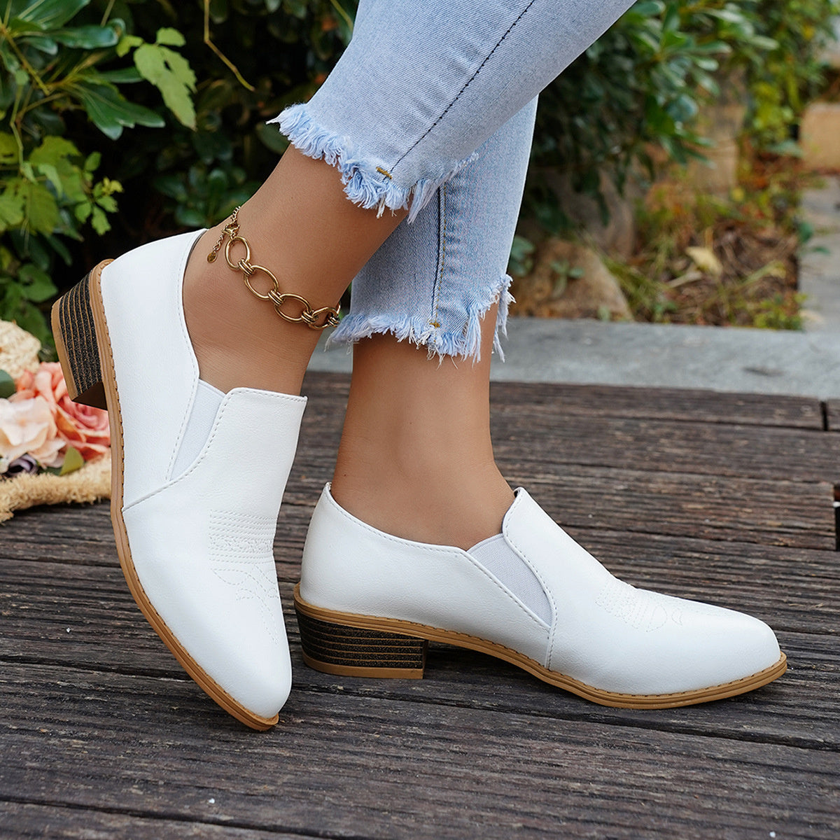White loafers with slip-on and embroidered