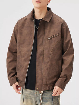 Brown leather jacket with zip-up front and chest pocket detail