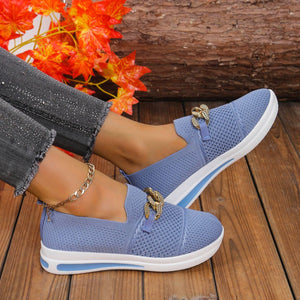 Sky blue mesh slip-on flats with chunky gold chain detail.
