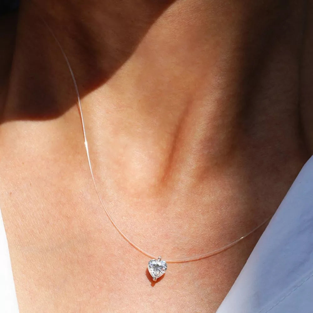 necklace in clear featuring heart-shaped pendant and fitted fit