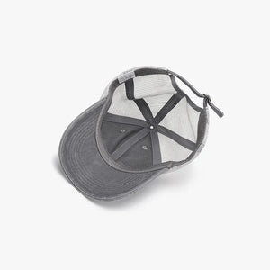 Gray vintage wash trucker hat with mesh back and adjustable strap.