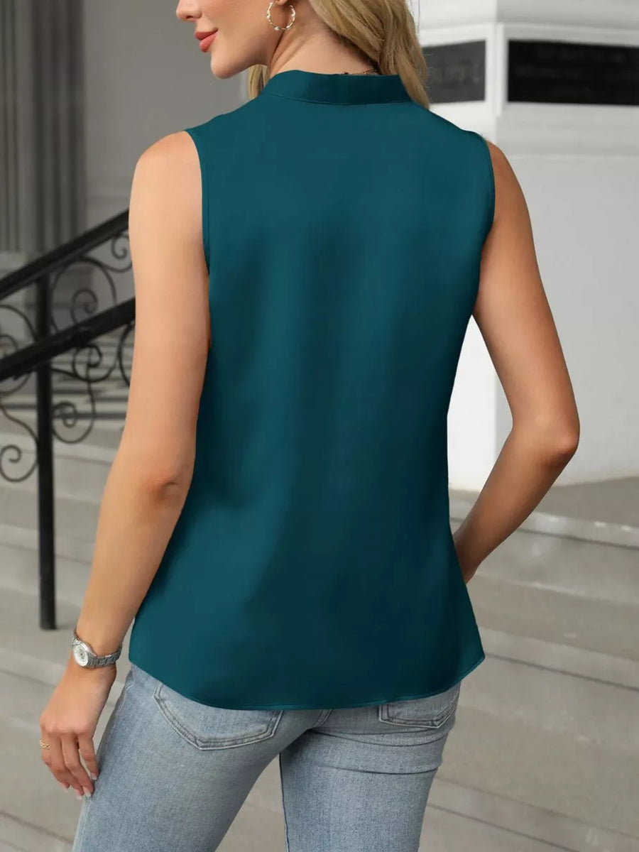 Sea blue lustrous satin V-neck tank top with a sleeveless cut.