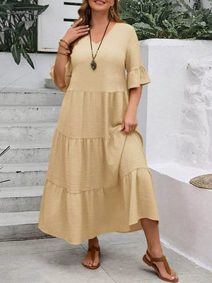 Apricot tiered midi dress with ruffle sleeves and v-neck, crinkled fabric