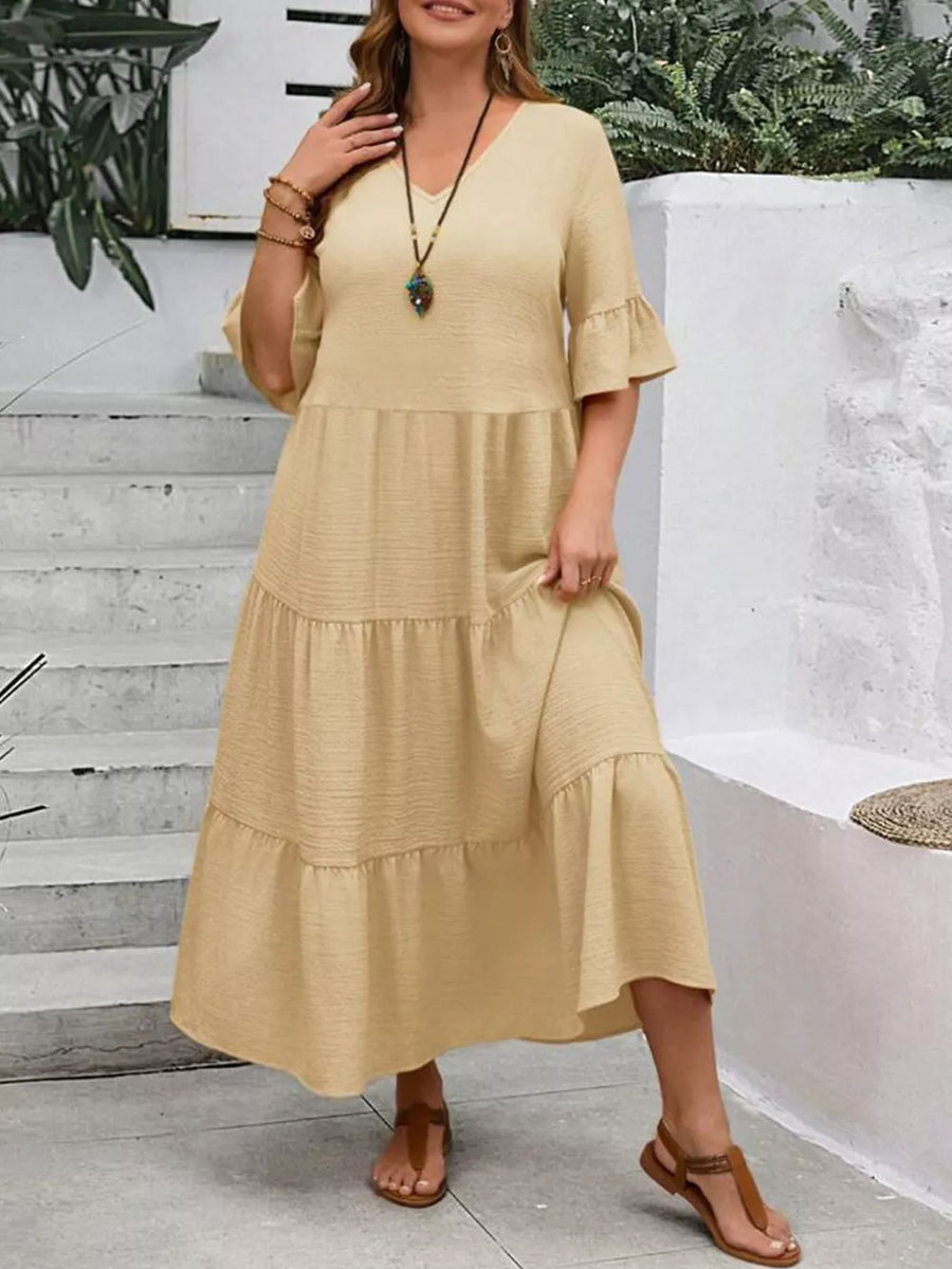 Apricot tiered midi dress with ruffle sleeves and v-neck, crinkled fabric