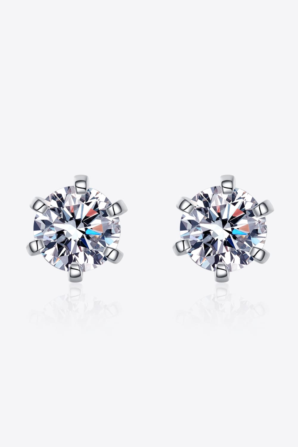 Silver six-prong solitaire stud earrings with clear cubic zirconia stones