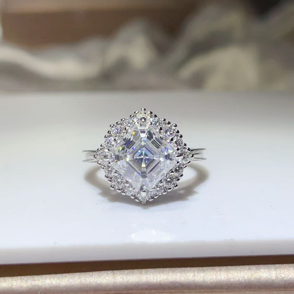 ring in silver featuring halo setting and classic fit