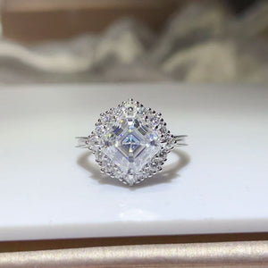 ring in silver featuring halo setting and classic fit