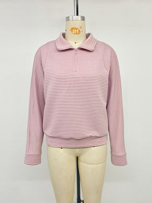 blush pink sweatshirt with quarter-zip and ribbed