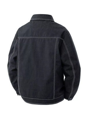 Black oversized denim trucker jacket with allover logo pattern and contrast stitching.