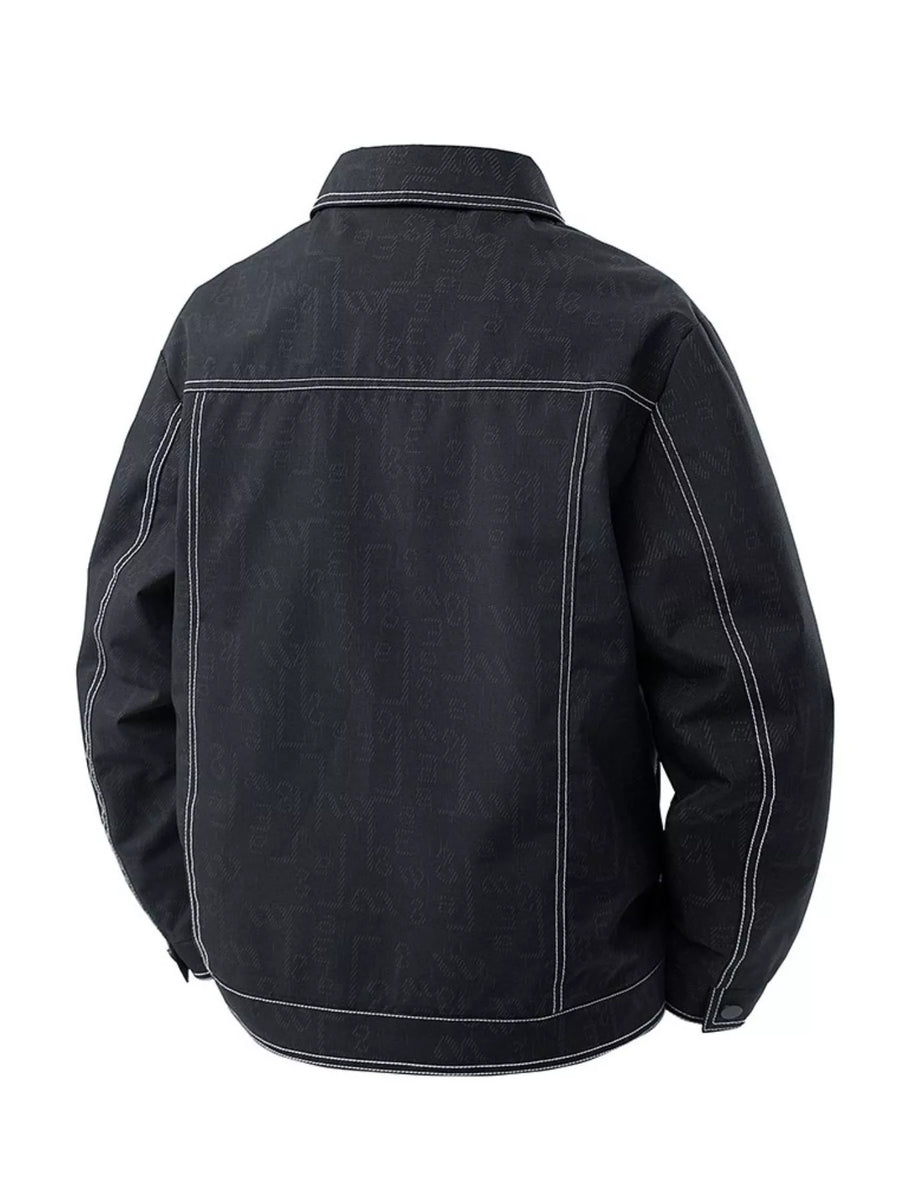 Black oversized denim trucker jacket with allover logo pattern and contrast stitching.