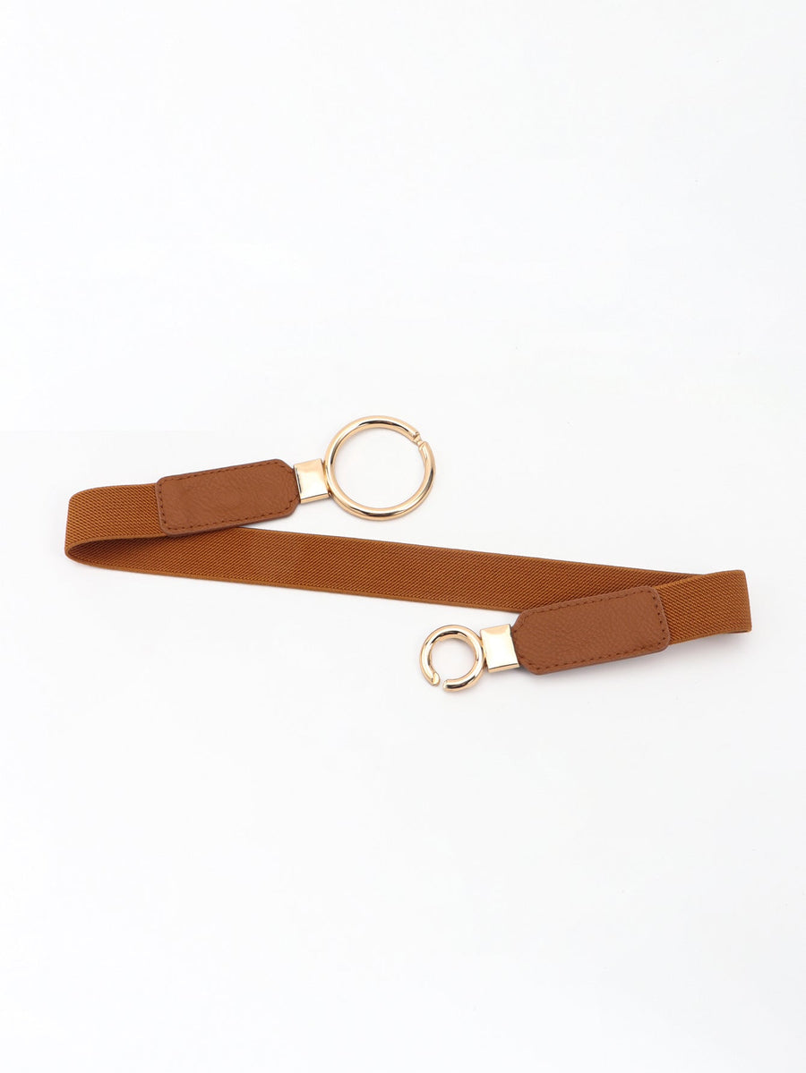 Tan elastic belt with interlocked gold rings and faux leather accents