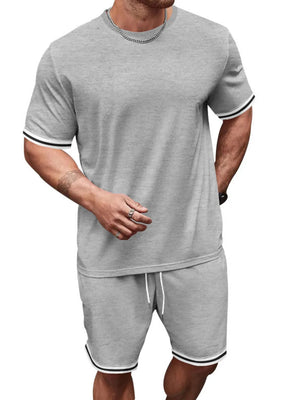 Grey t-shirt and shorts set with striped cuffs and hem.