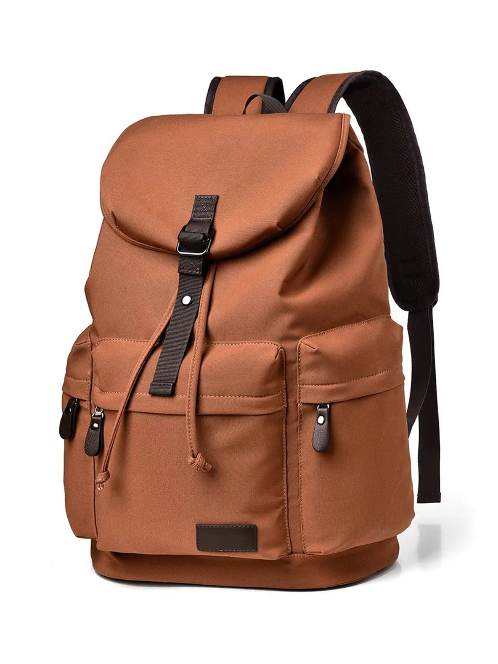 Ochre canvas backpack with brown leather accents and multiple pockets.