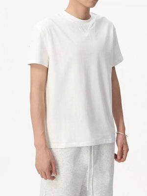White cotton spandex casual tee with round neck and short sleeves.