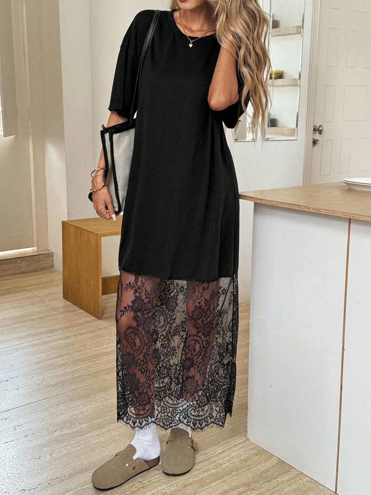 black t-shirt dress with floral and round neck