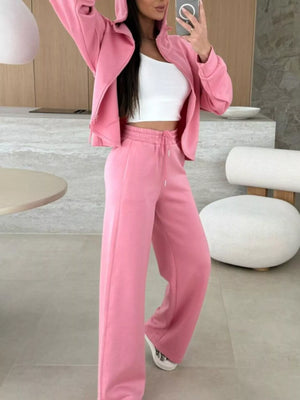 Dusty pink relaxed fit zip-up hoodie and wide-leg drawstring pants set.