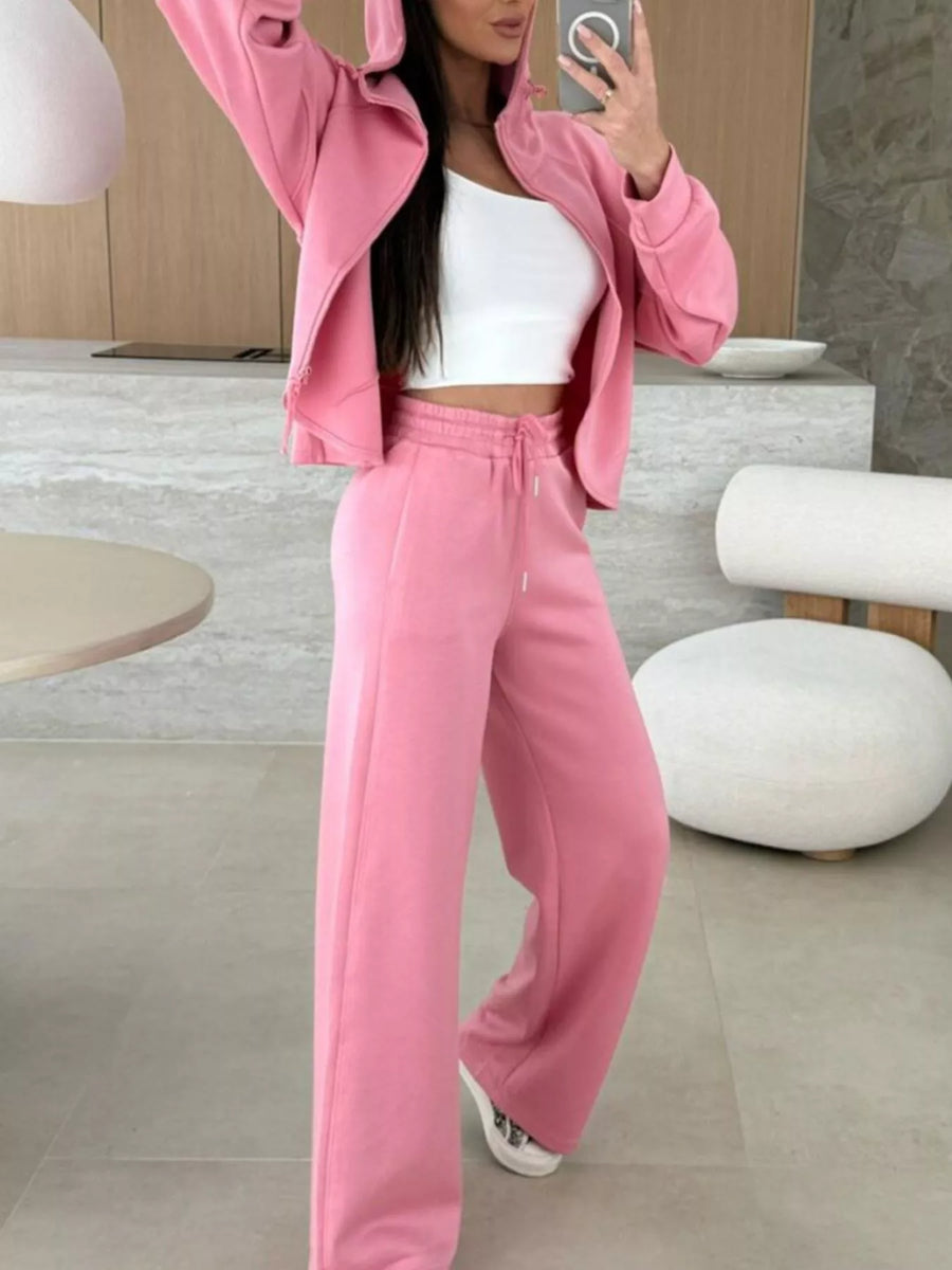 Dusty pink relaxed fit zip-up hoodie and wide-leg drawstring pants set.