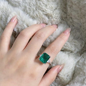 silver ring featuring zircon gemstone and geometric