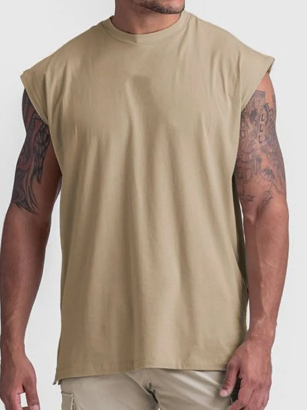 Khaki performance cut sleeveless tee with crew neck and wide armholes.