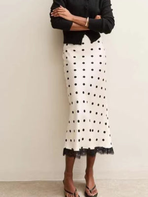 100% polyester Care instructions: Machine wash cold midi skirt in White with flared silhouette
